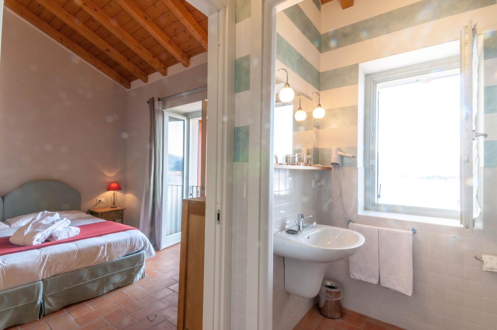 Locanda Pozzetto لافينو-مومبيلو الغرفة الصورة